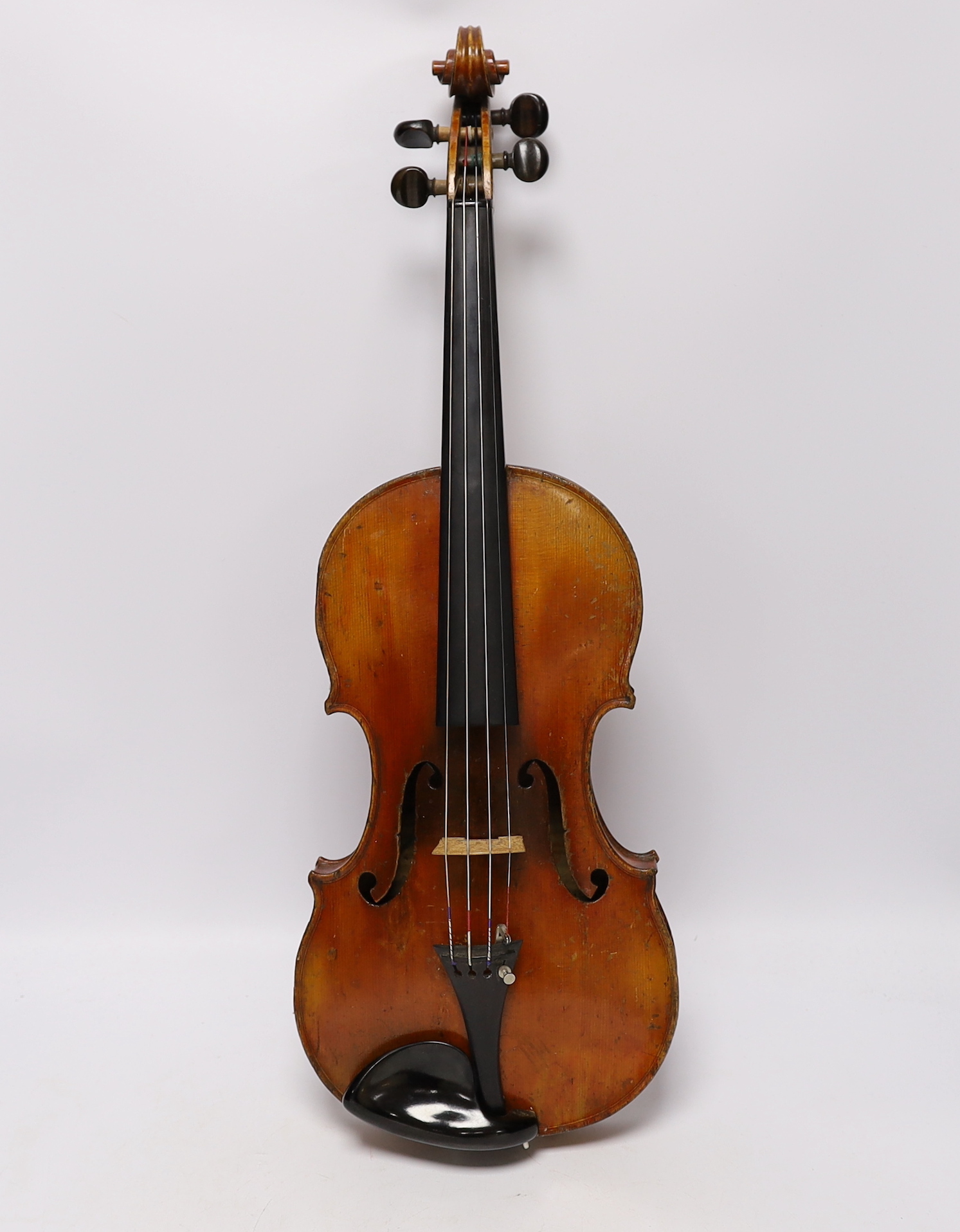 A cased late 19th/early 20th century French violin, bears Joseph Guarnerius label